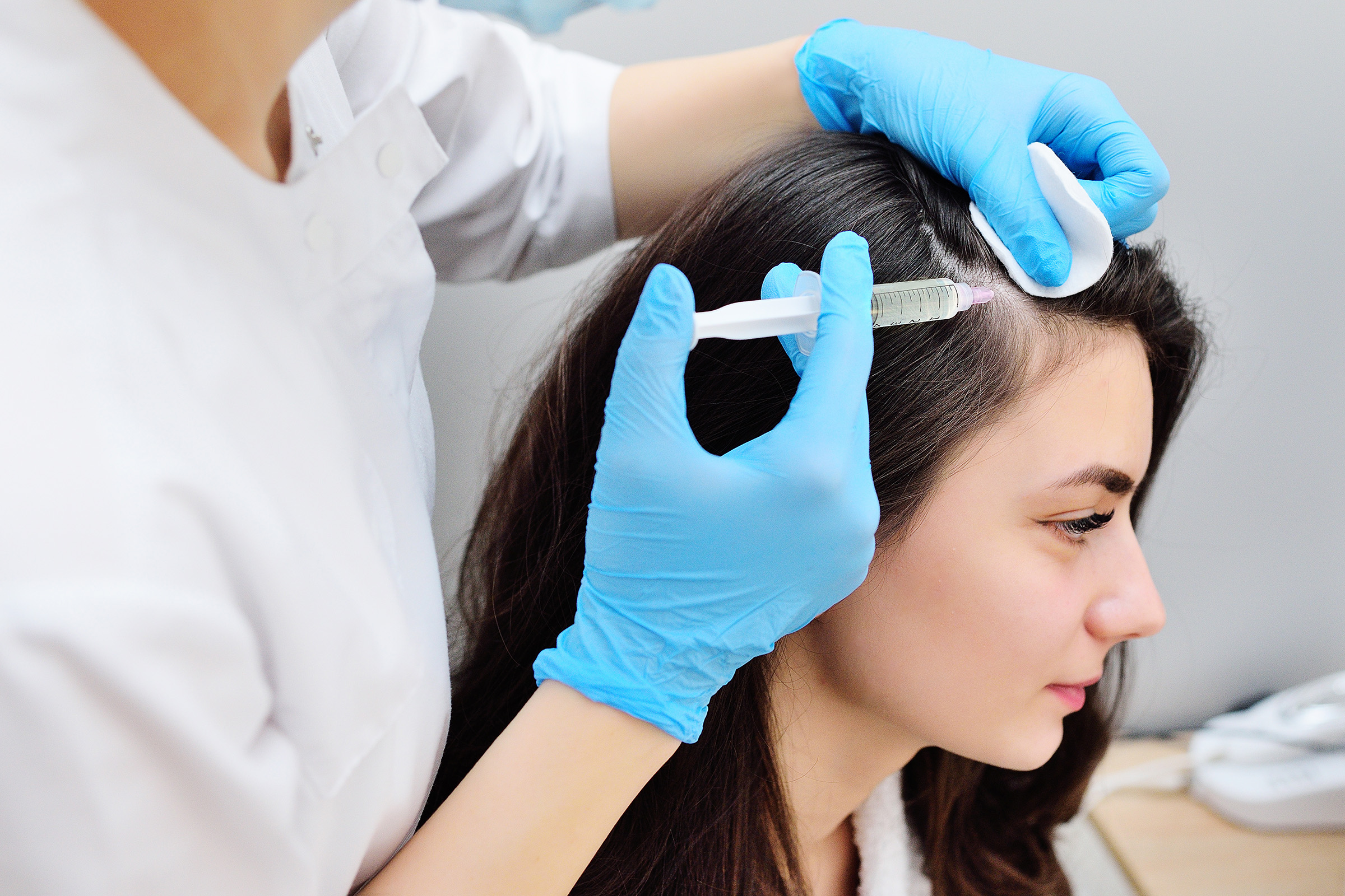 woman receiving plasma-rich platelet treatment